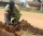 Amanzuru William Leslie plants a tree